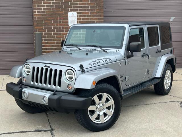 used 2016 Jeep Wrangler Unlimited car, priced at $22,975