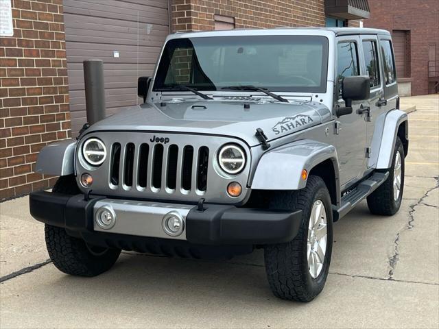 used 2016 Jeep Wrangler Unlimited car, priced at $22,975