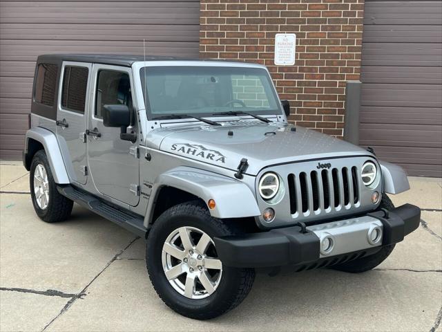 used 2016 Jeep Wrangler Unlimited car, priced at $22,975