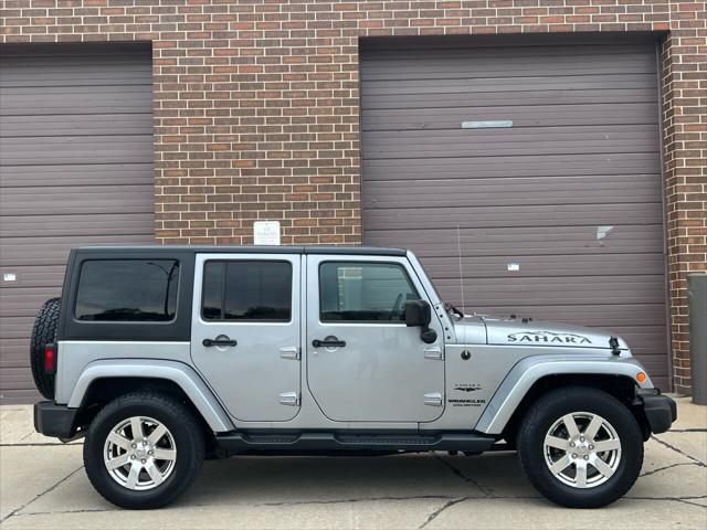 used 2016 Jeep Wrangler Unlimited car, priced at $22,975