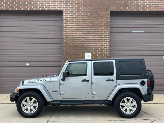 used 2016 Jeep Wrangler Unlimited car, priced at $22,975