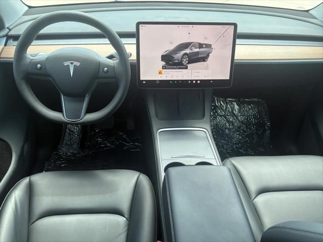 used 2023 Tesla Model Y car, priced at $31,125