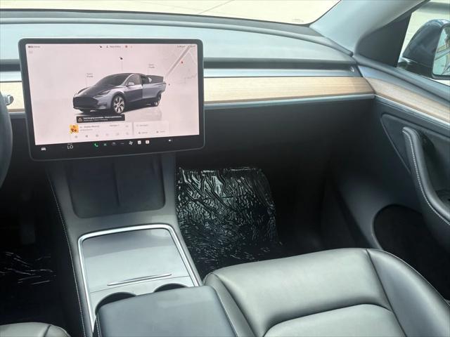 used 2023 Tesla Model Y car, priced at $31,125