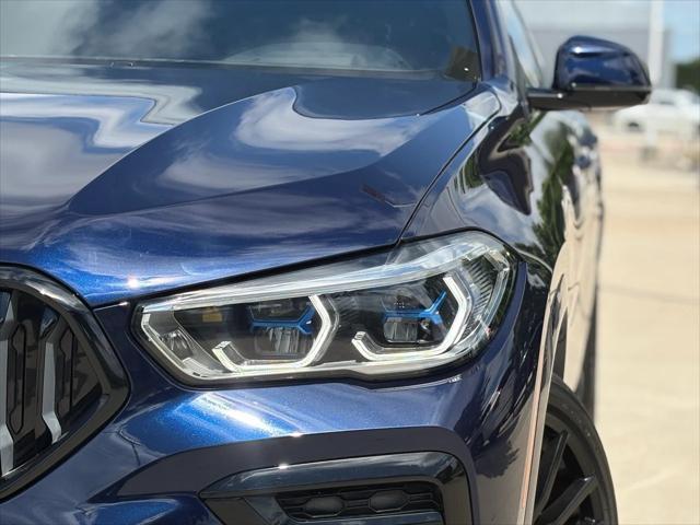 used 2023 BMW X6 car, priced at $70,880