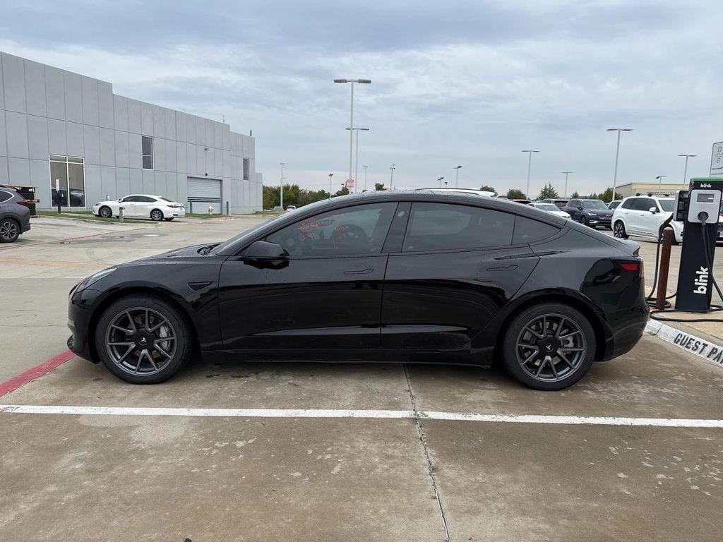used 2023 Tesla Model 3 car, priced at $26,498