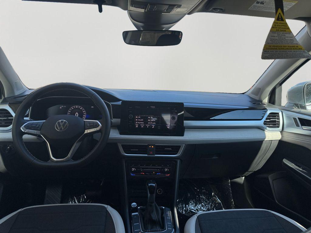 new 2025 Volkswagen Taos car, priced at $27,010