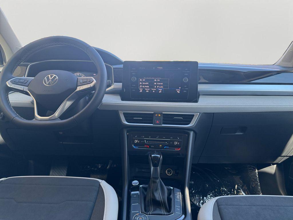 new 2025 Volkswagen Taos car, priced at $27,010