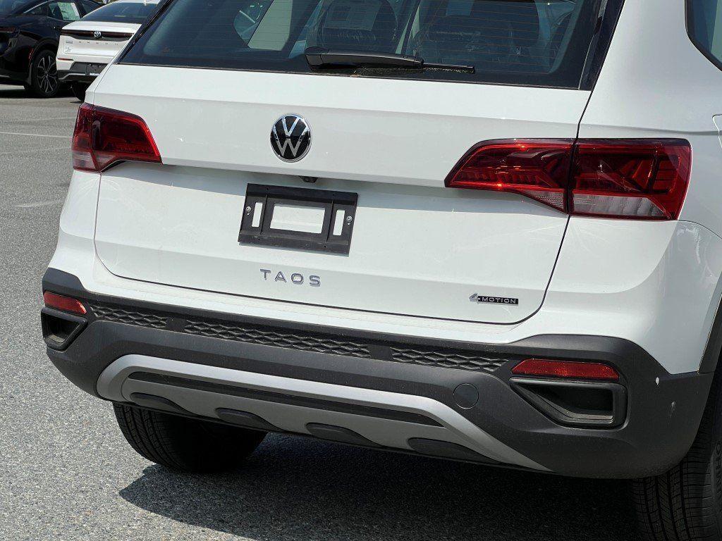 new 2024 Volkswagen Taos car, priced at $23,376