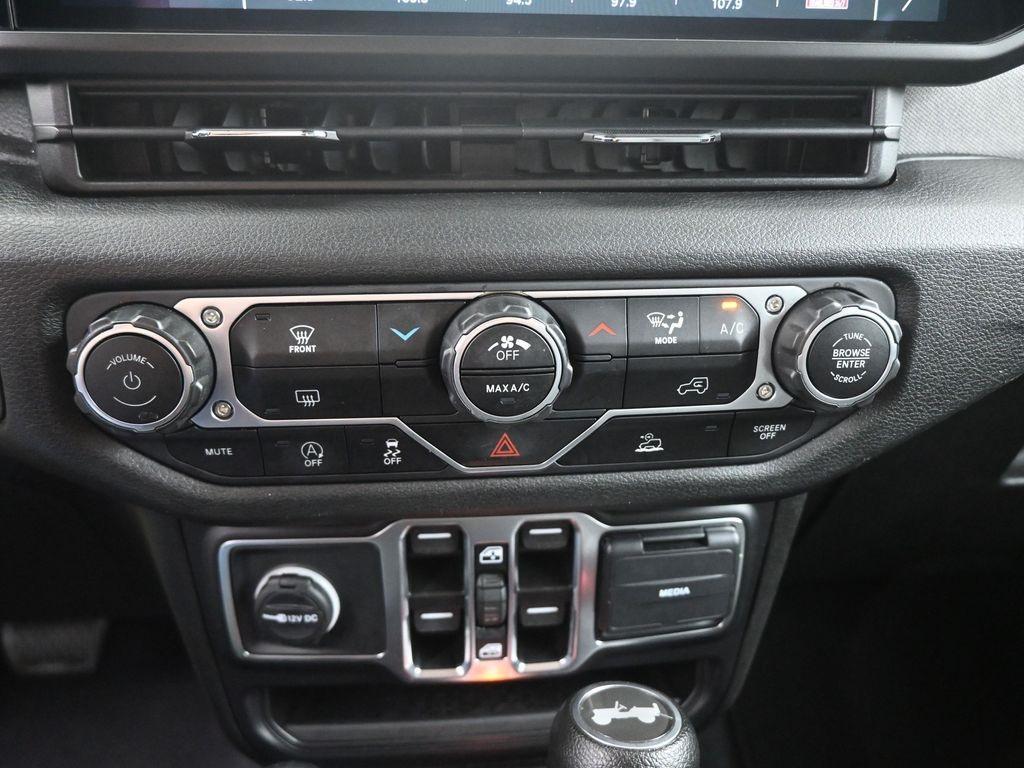 used 2024 Jeep Wrangler car, priced at $37,841