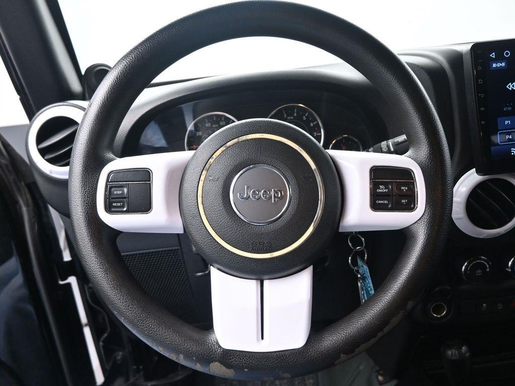 used 2012 Jeep Wrangler Unlimited car, priced at $13,193