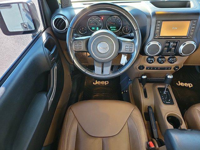 used 2014 Jeep Wrangler Unlimited car, priced at $16,479