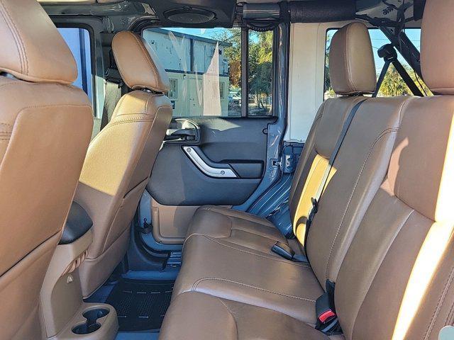 used 2014 Jeep Wrangler Unlimited car, priced at $16,479