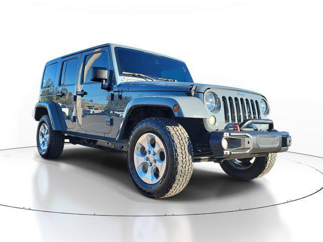 used 2014 Jeep Wrangler Unlimited car, priced at $16,479