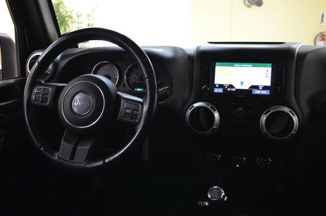 used 2014 Jeep Wrangler Unlimited car, priced at $17,991