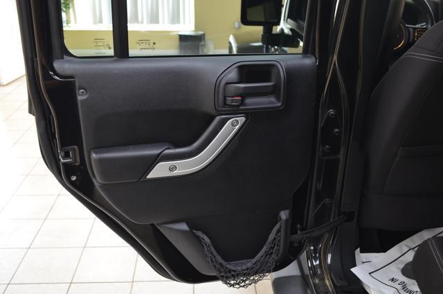 used 2014 Jeep Wrangler Unlimited car, priced at $17,991
