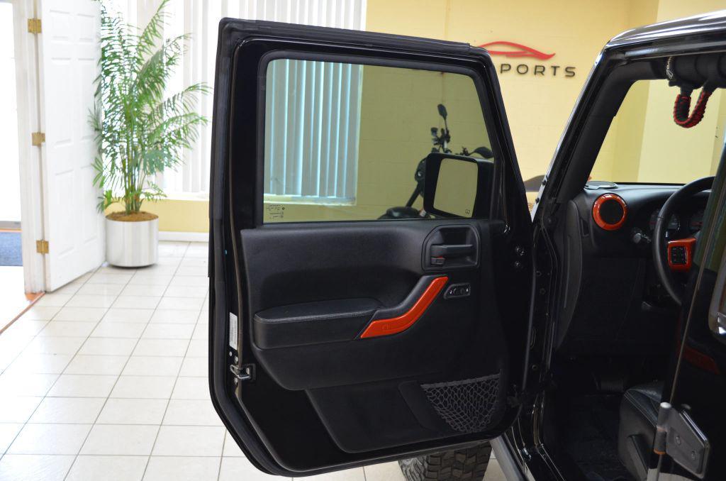 used 2016 Jeep Wrangler Unlimited car, priced at $22,991