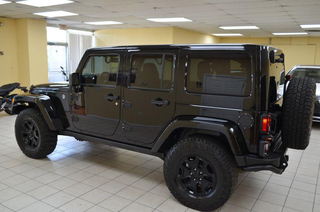 used 2016 Jeep Wrangler Unlimited car, priced at $22,991