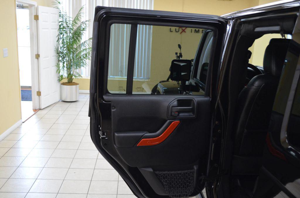 used 2016 Jeep Wrangler Unlimited car, priced at $22,991