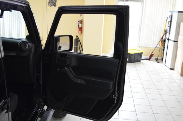 used 2011 Jeep Wrangler Unlimited car, priced at $14,991