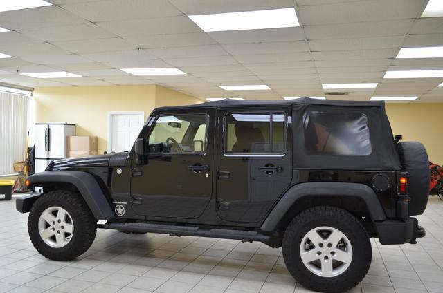 used 2011 Jeep Wrangler Unlimited car, priced at $14,991