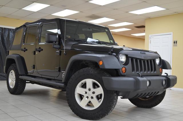 used 2011 Jeep Wrangler Unlimited car, priced at $14,991