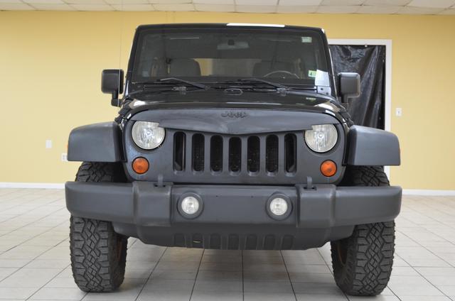 used 2011 Jeep Wrangler Unlimited car, priced at $14,991