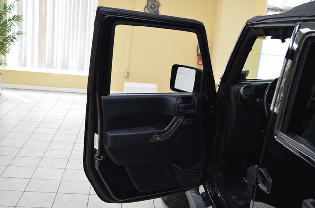 used 2011 Jeep Wrangler Unlimited car, priced at $14,991