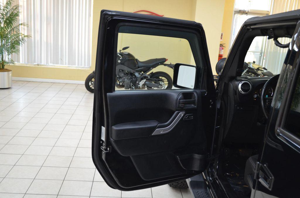 used 2015 Jeep Wrangler Unlimited car, priced at $15,741