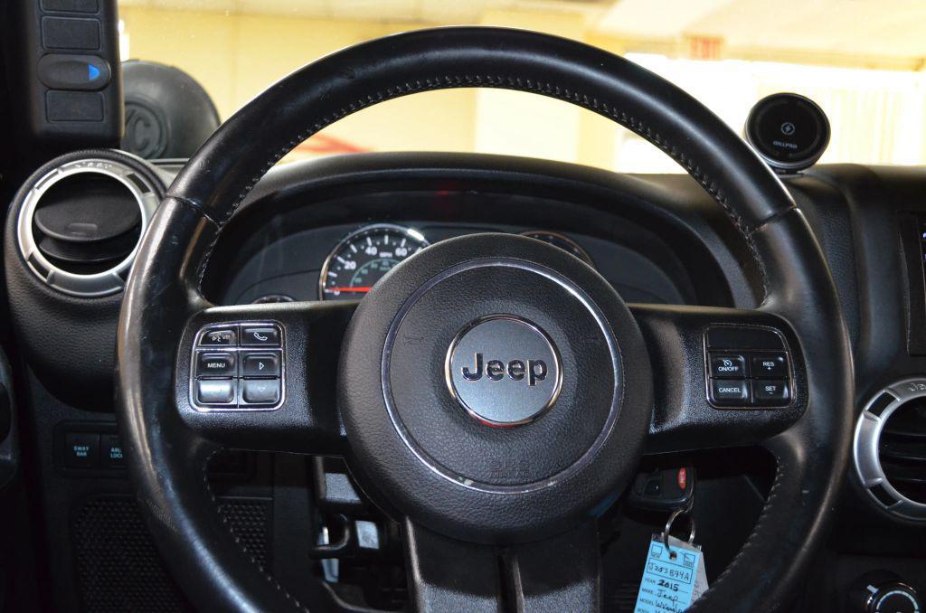 used 2015 Jeep Wrangler Unlimited car, priced at $15,741