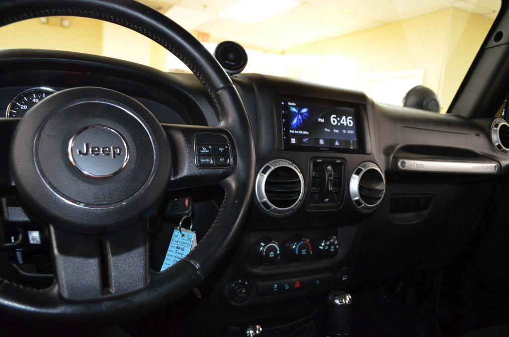 used 2015 Jeep Wrangler Unlimited car, priced at $15,741
