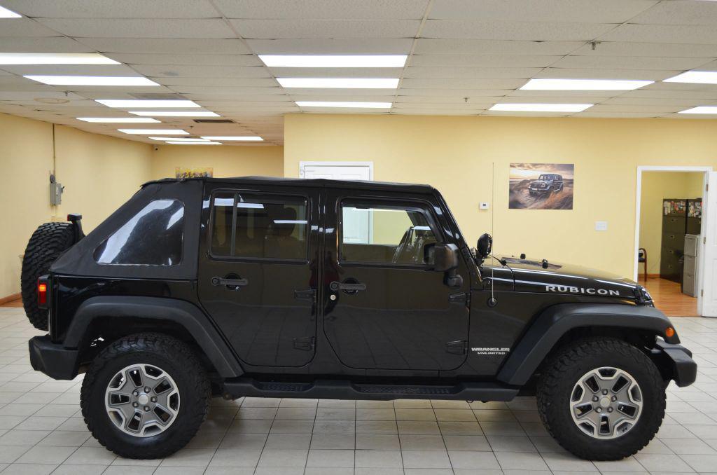 used 2015 Jeep Wrangler Unlimited car, priced at $15,741