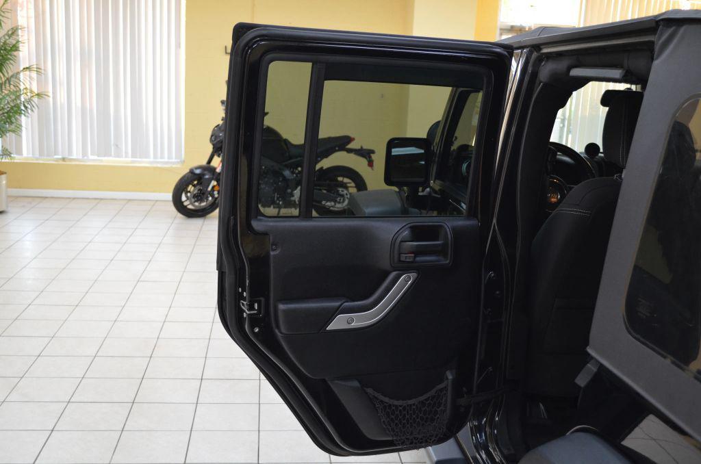 used 2015 Jeep Wrangler Unlimited car, priced at $15,741