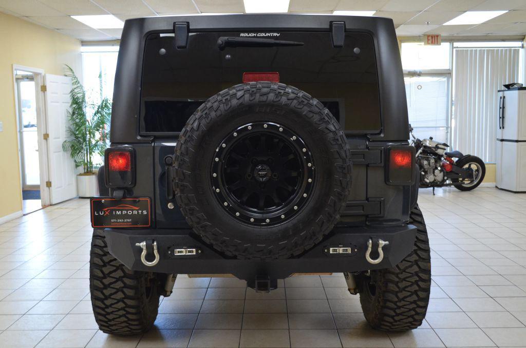 used 2016 Jeep Wrangler Unlimited car, priced at $15,991