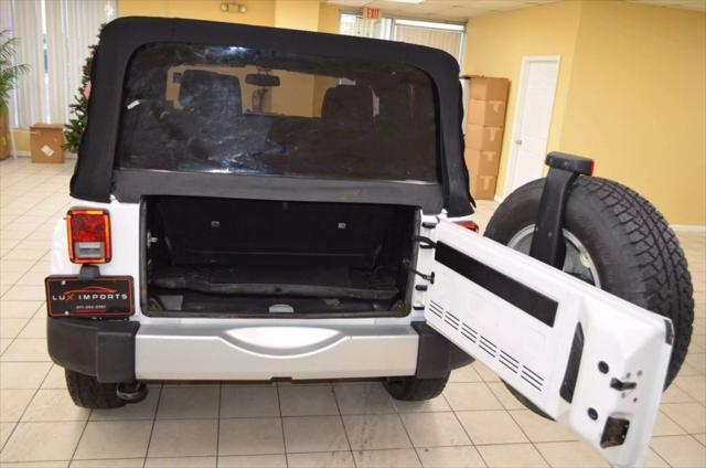 used 2015 Jeep Wrangler car, priced at $13,991