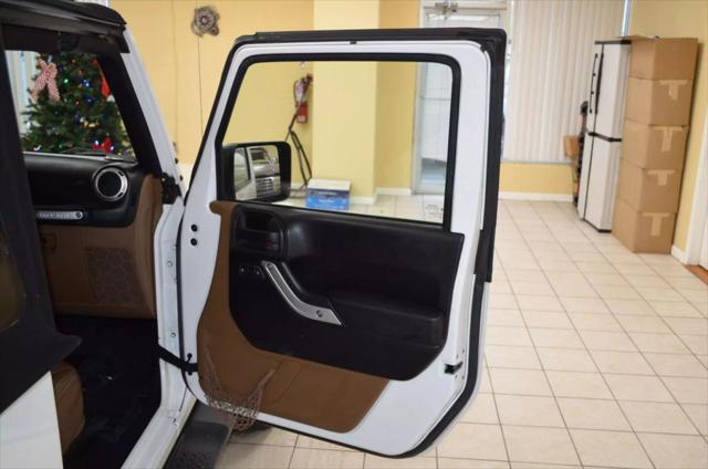 used 2015 Jeep Wrangler car, priced at $13,991