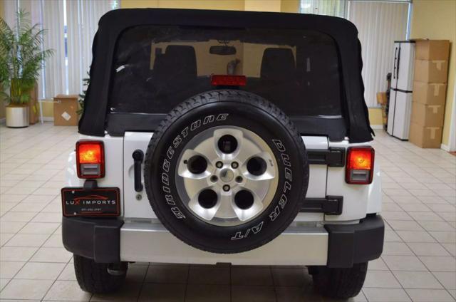 used 2015 Jeep Wrangler car, priced at $13,991
