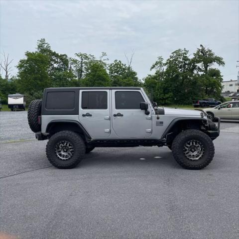 used 2015 Jeep Wrangler Unlimited car, priced at $21,991