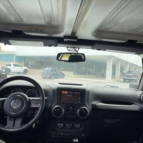 used 2015 Jeep Wrangler Unlimited car, priced at $21,991