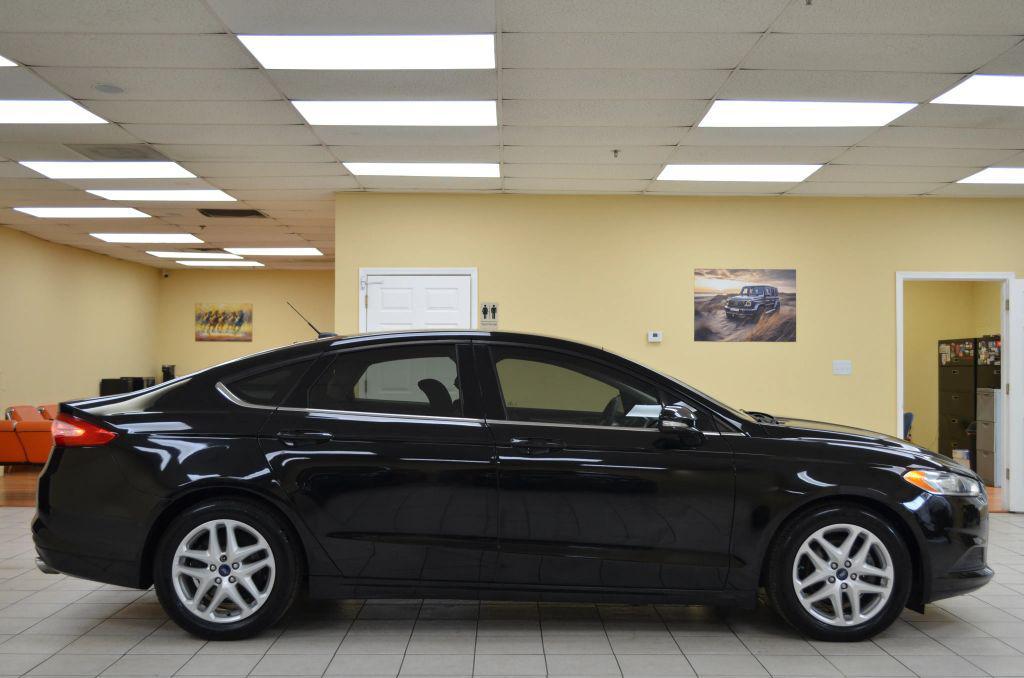 used 2016 Ford Fusion car, priced at $7,741