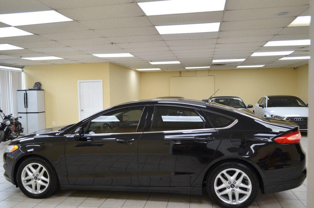 used 2016 Ford Fusion car, priced at $7,741