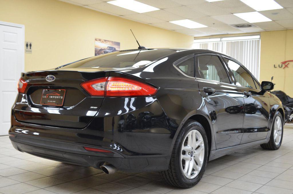 used 2016 Ford Fusion car, priced at $7,741