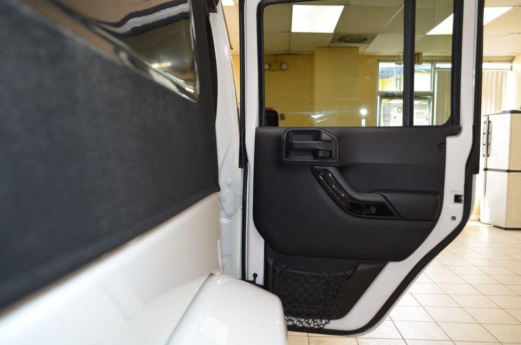 used 2014 Jeep Wrangler Unlimited car, priced at $15,991