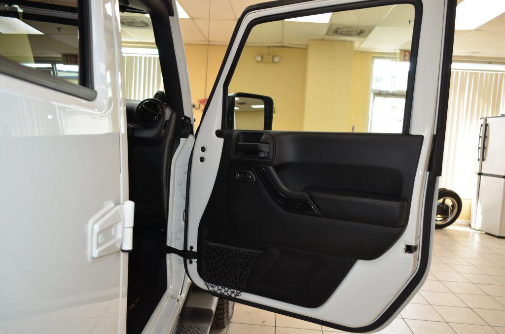 used 2014 Jeep Wrangler Unlimited car, priced at $15,991