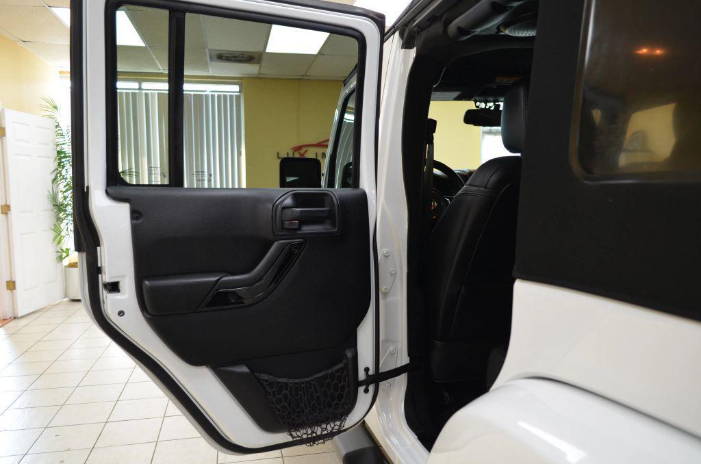 used 2014 Jeep Wrangler Unlimited car, priced at $15,991