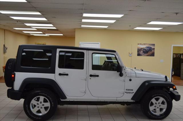 used 2014 Jeep Wrangler Unlimited car, priced at $15,741