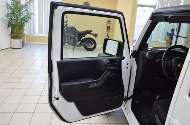 used 2014 Jeep Wrangler Unlimited car, priced at $15,741