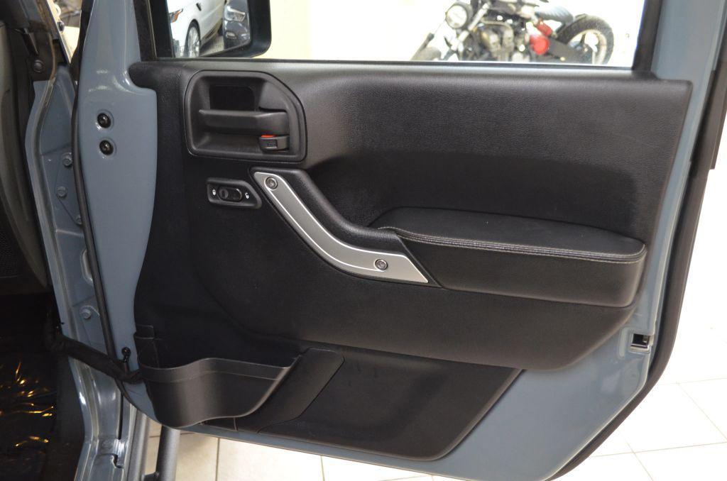 used 2015 Jeep Wrangler Unlimited car, priced at $20,991