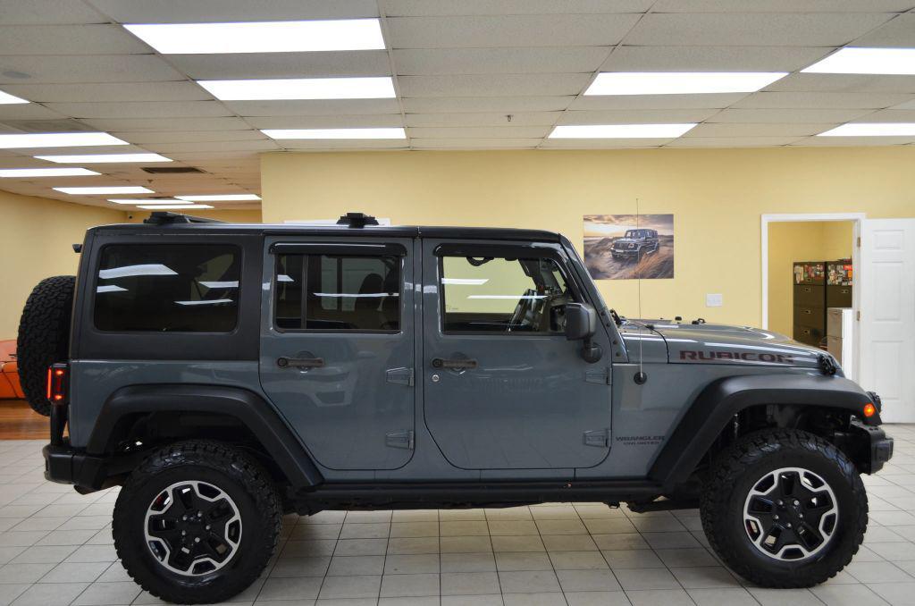 used 2015 Jeep Wrangler Unlimited car, priced at $20,991