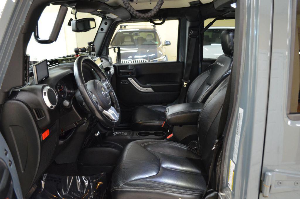 used 2015 Jeep Wrangler Unlimited car, priced at $20,991