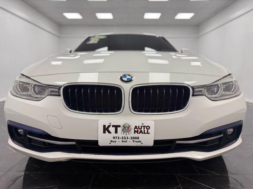 used 2018 BMW 330 car, priced at $12,495